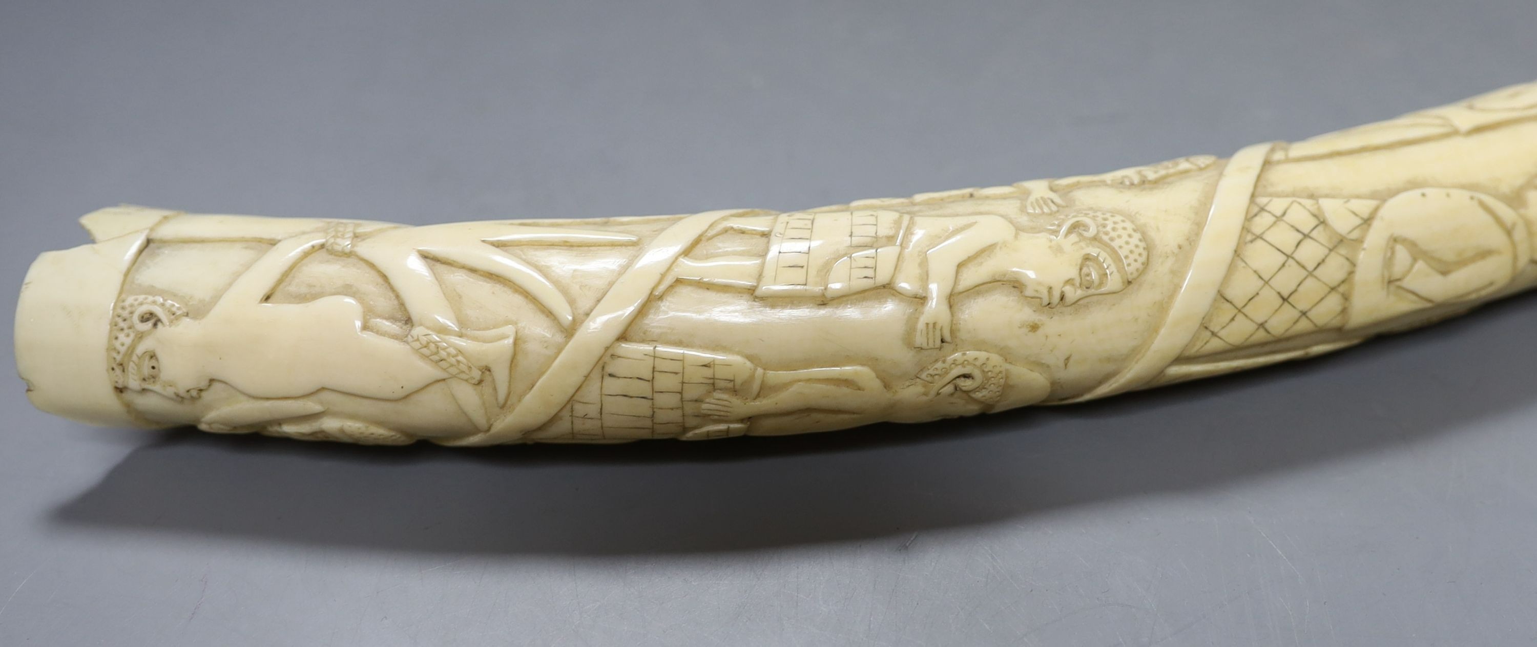 A 19th-century Luango tribal carved ivory tusk, Democratic Republic of Congo, 53 cm long